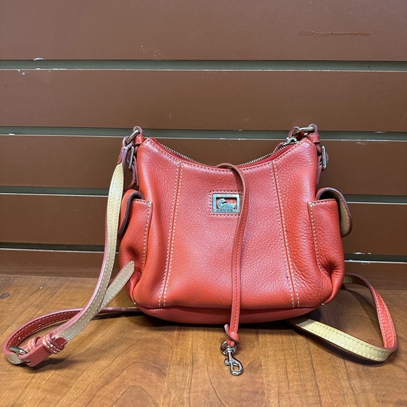 Dooney & Bourke Handbags - Dooney & Bourke Orange Leather Crossbody Bag